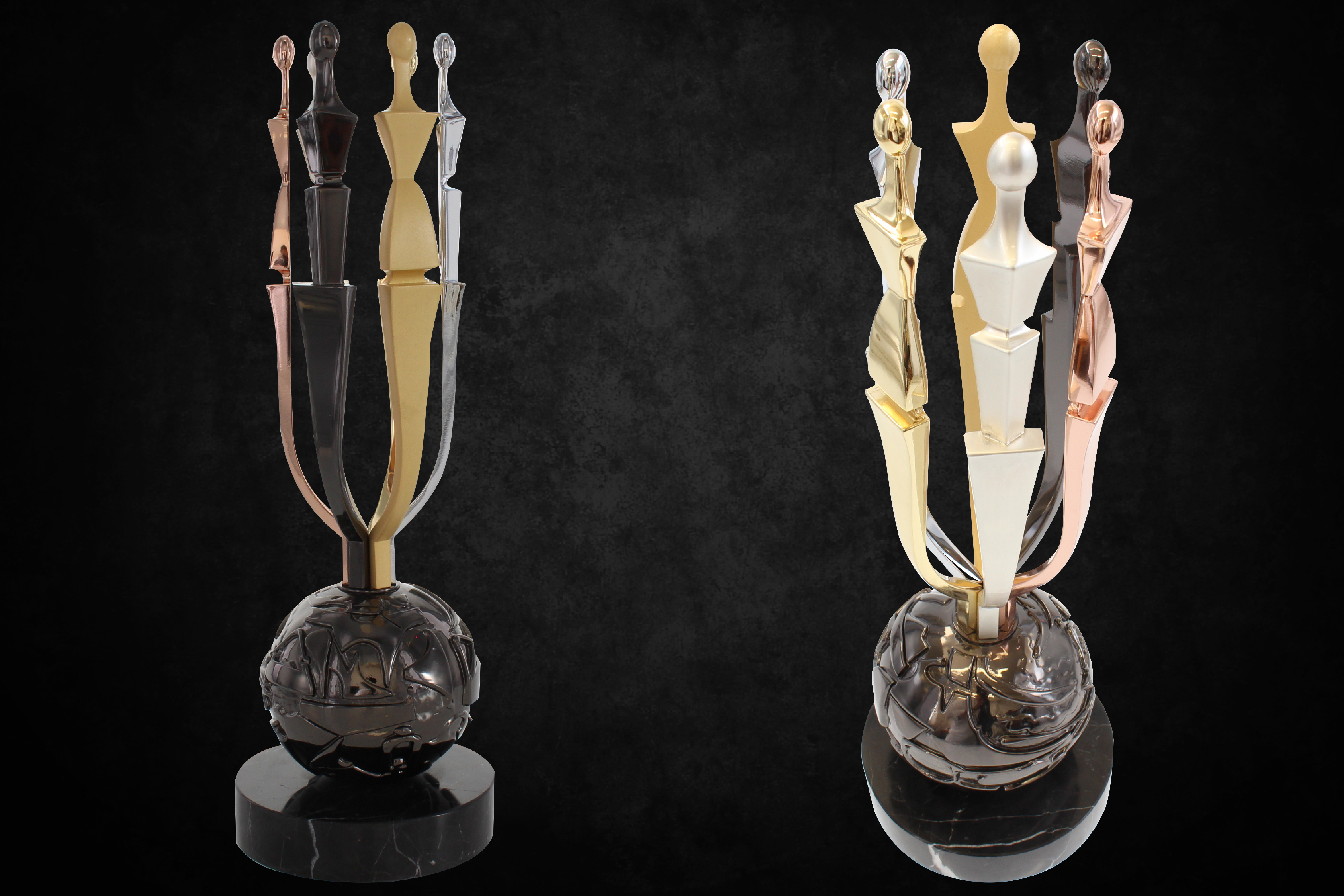 AAFA American Image Awards trophy, a marble base with a black chrome globe, 6 abstact figures emerging from the top