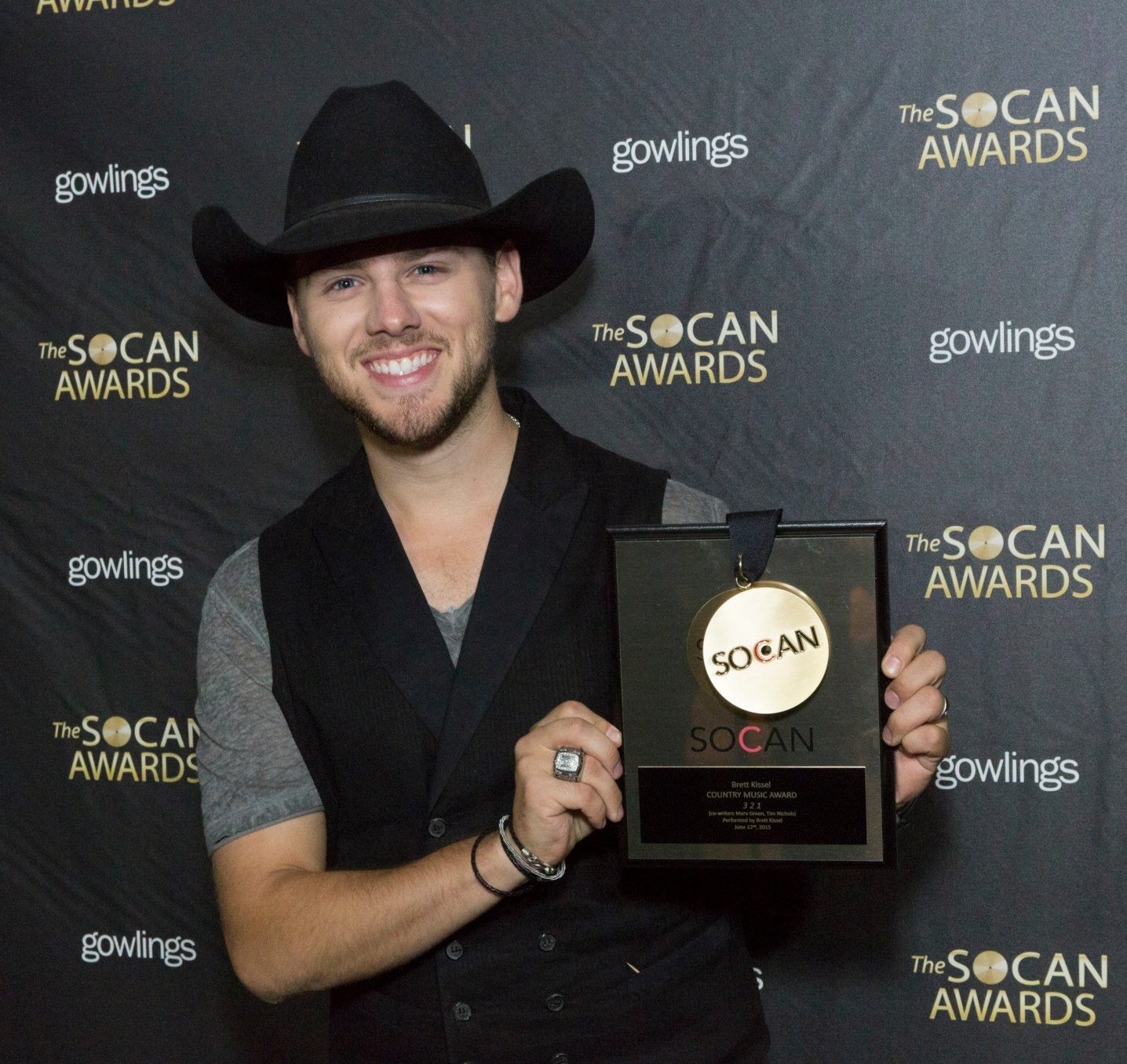 Country music artist Brett Kissel at the 2015 SOCAN Awards, holding the SOCAN Awards Plaque for Best Country Music Song