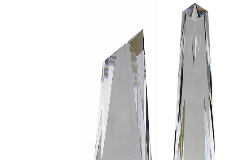 Side and front views of the prismatic top of the Metropolis Crystal award