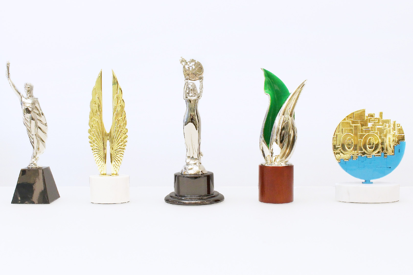 Five Custom Metal Trophies created by Society Awards for AMCP