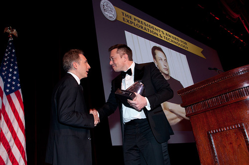 SpaceX Founder and CEO Elon Musk accepting an Explorer's Club trophy on-stage at the Annual Dinner Gala