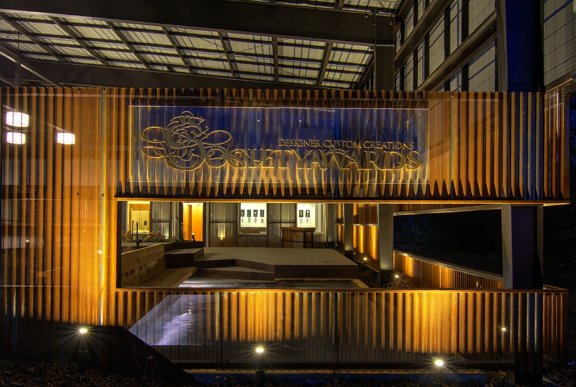 society awards metal sign at facility entrance