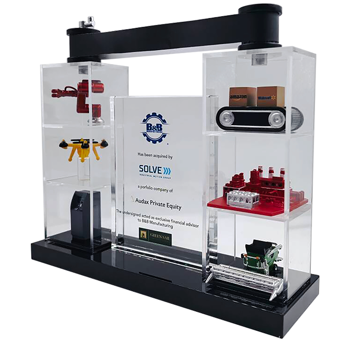 Manufacturing Plant examples on a clear acrylic deal toy. Financial Tombstones by Society Awards Finance Group