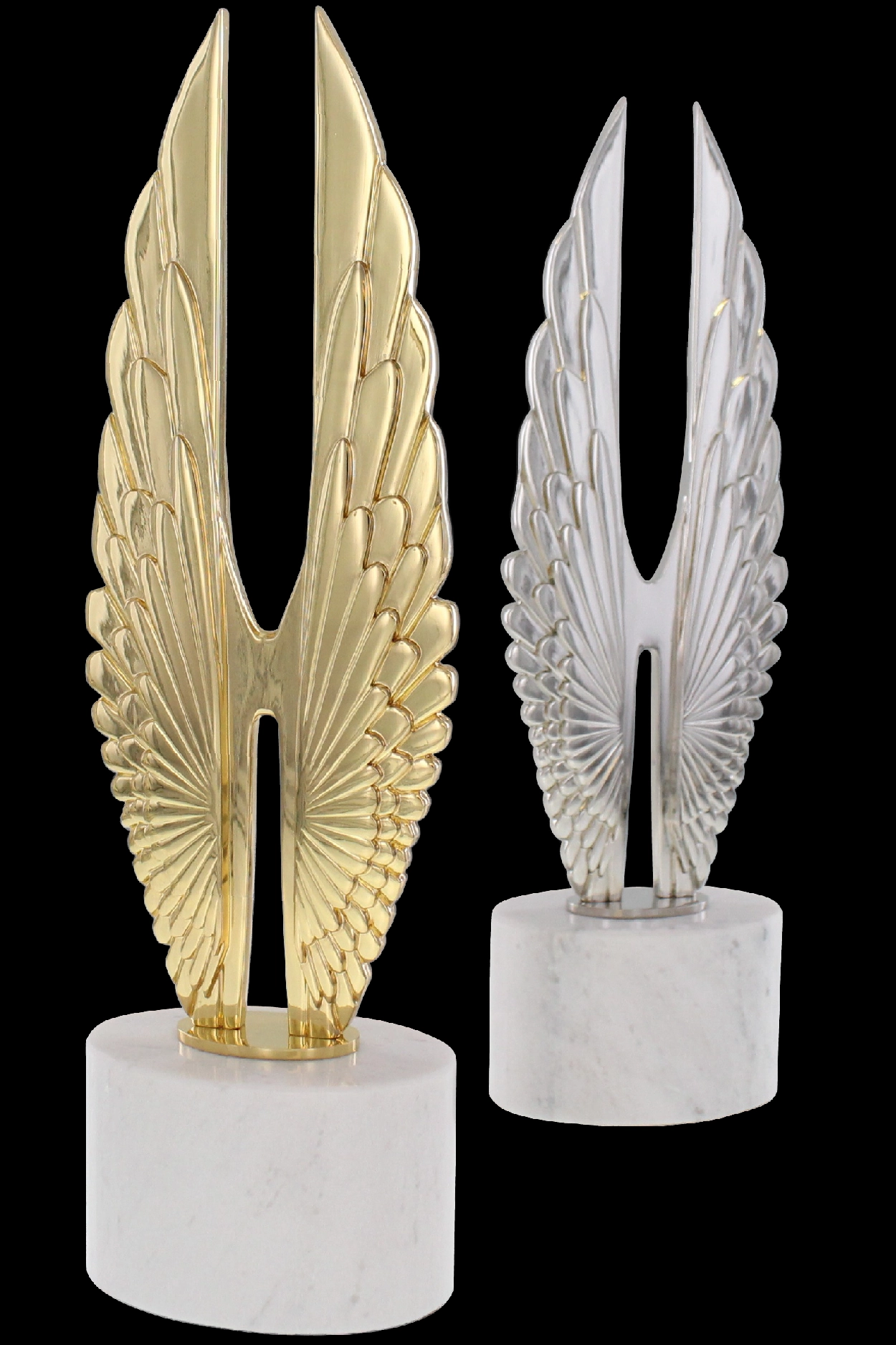 Gold and Silver Wing Awards mounted on white marble bases
