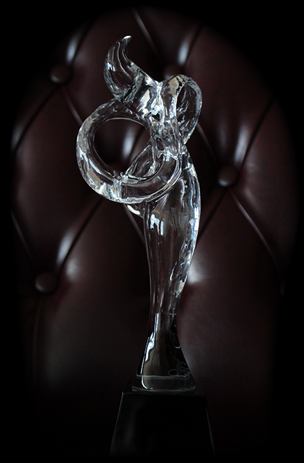 Elaborate Crystal Figure in Leather Chair