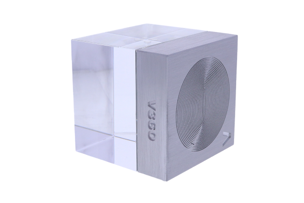 Silver metal and crystal cube with disc shape incorporated into the metal