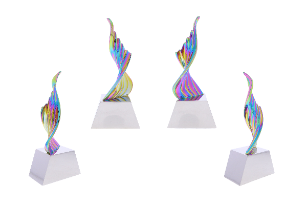 Stunning twisting chromatic IP sculpture atop a white base