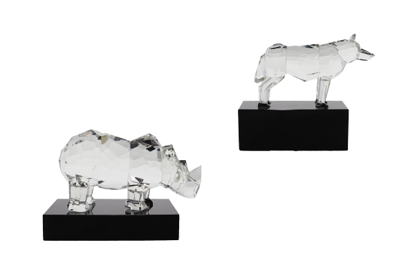 Custom crystal wolf and rhino atop rectangular black bases
