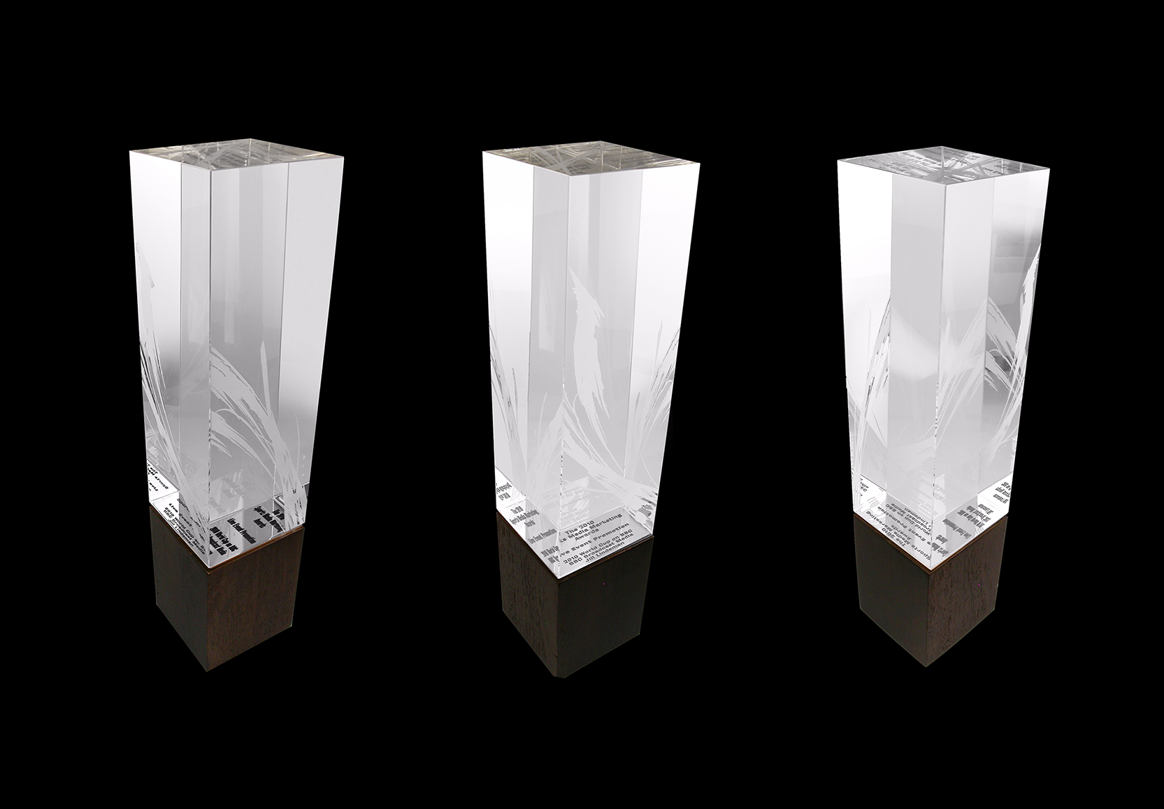 Custom etched crystal atop a black square base | Society Awards