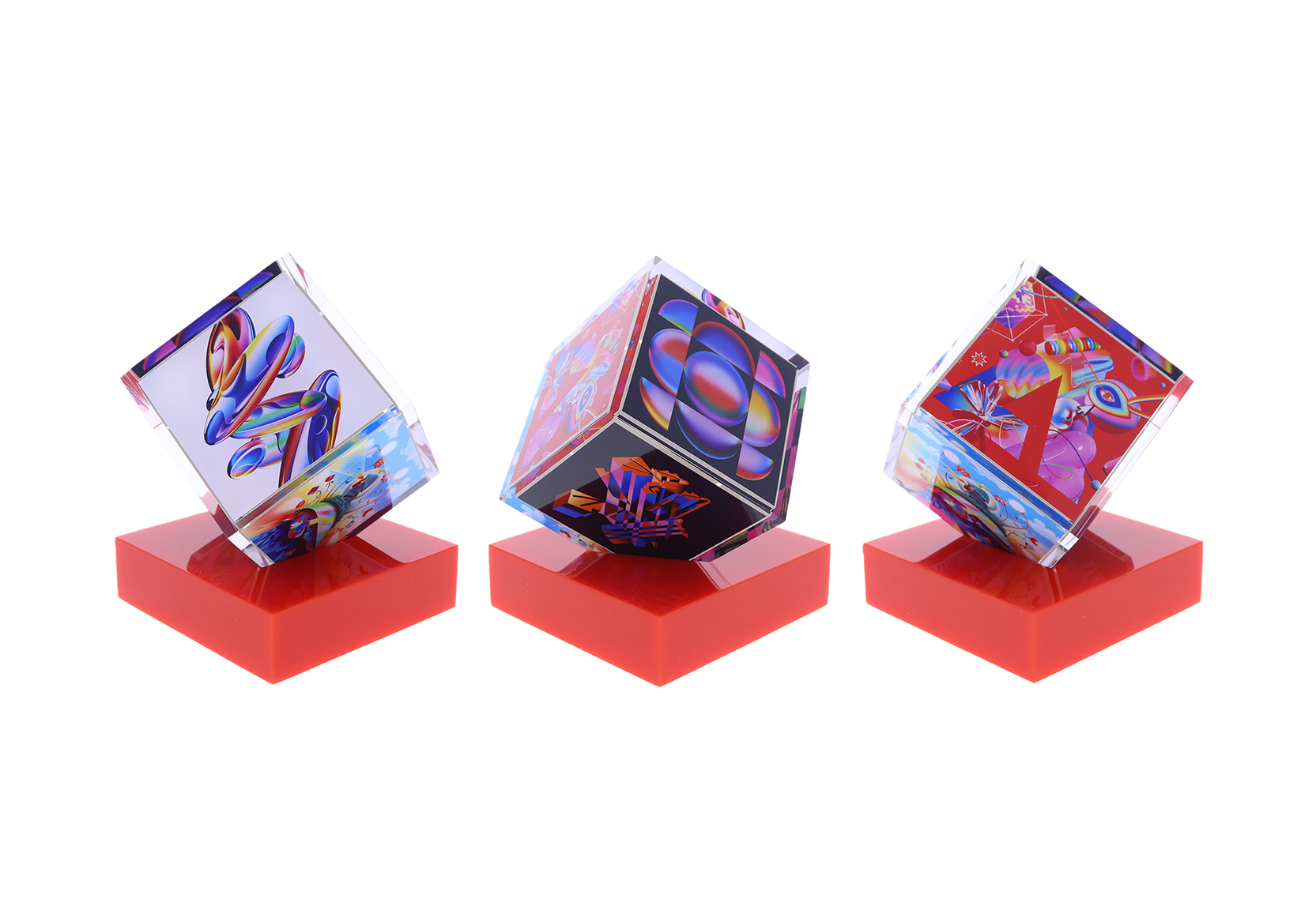 Spinning cube with unique graphics atop a red base | Society Awards