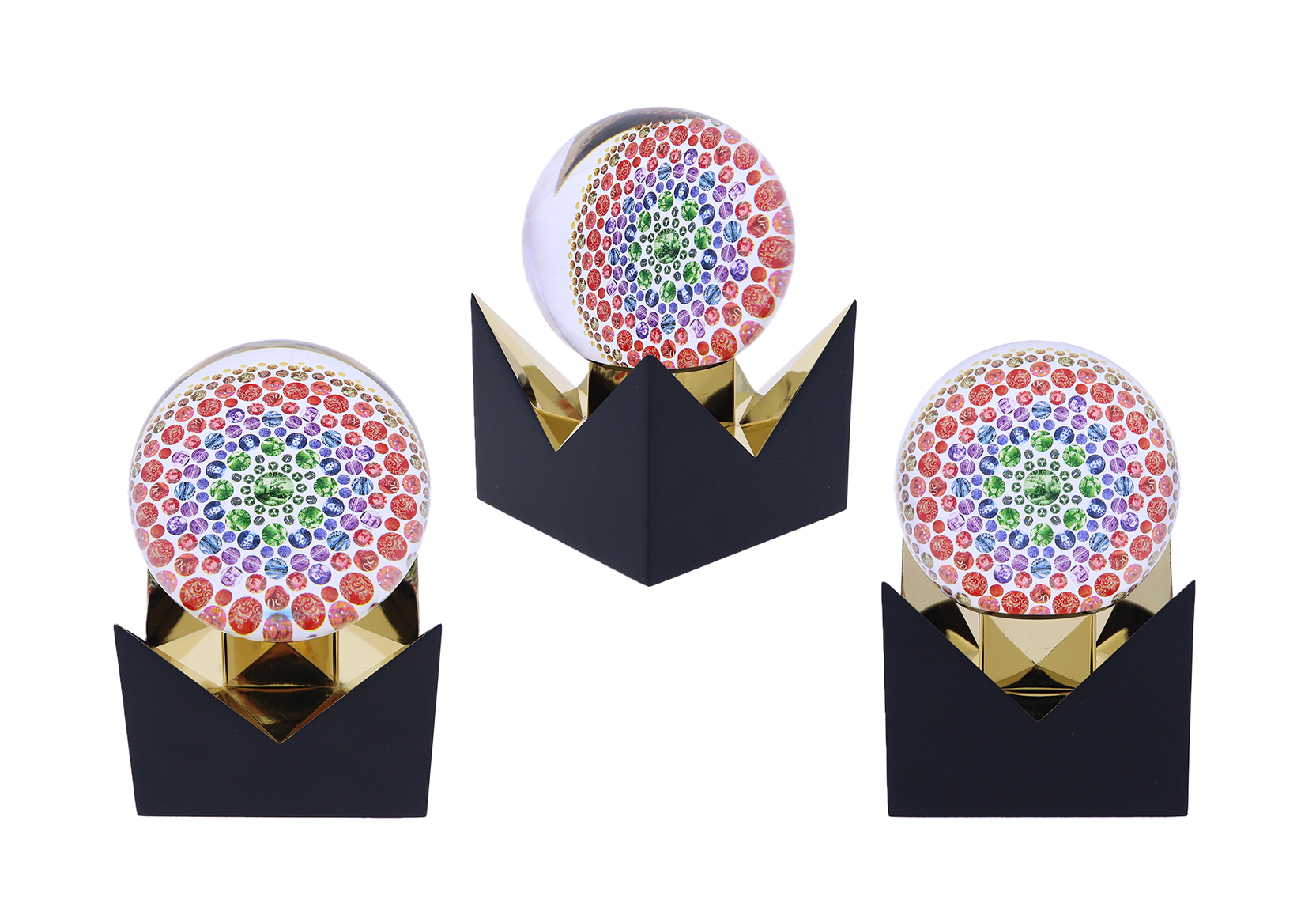 Intricately printed globe atop a black base with a gold interior