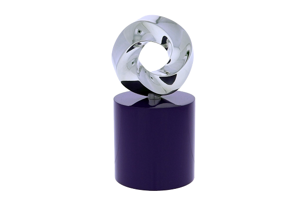 Twisting silver circle atop a black cylindrical base