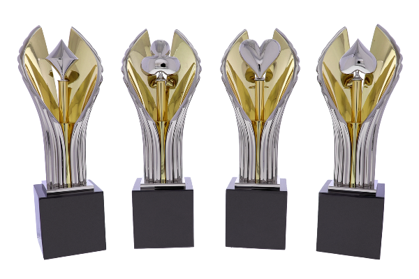 Custom poker awards with growing silver and gold columns wrapped around each suit's symbol