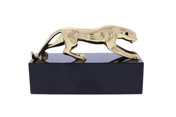 Gold prowling panther atop a black rectangular base