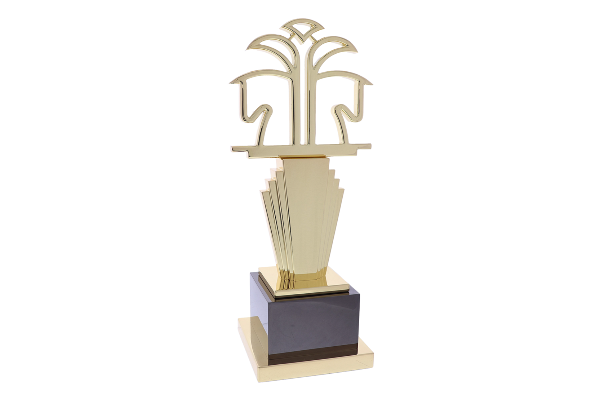 Custom trophy with the outline of two gold horse heads atop a cascading gold tower and black base