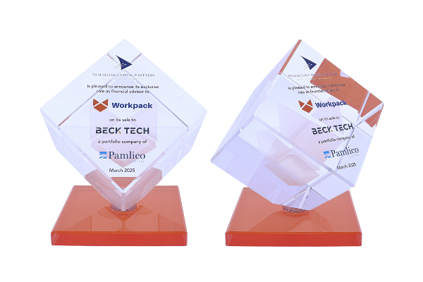 Decorated spinning tilted cube atop an orange base