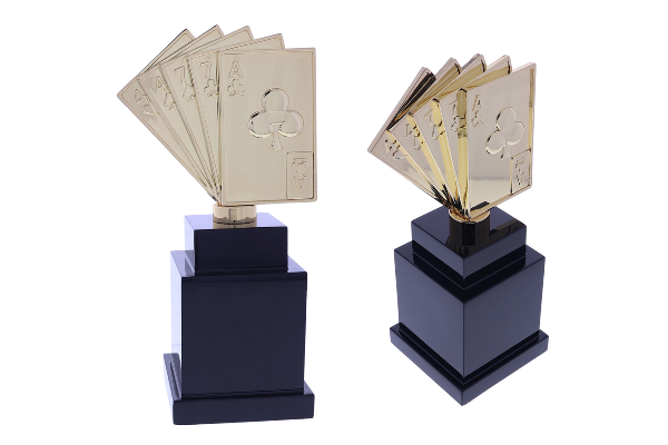 Gold fanned deck of cards atop a black base