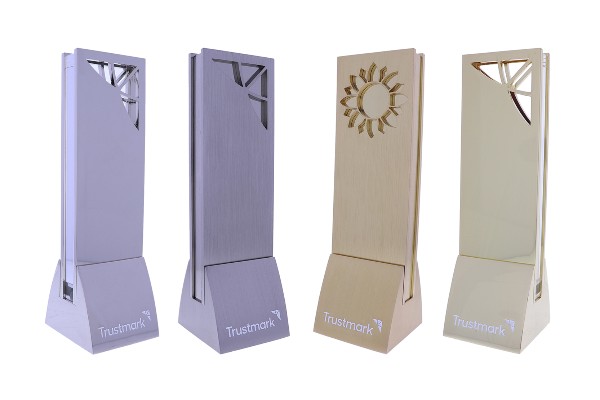Silver and gold columns with distinct cut outs, crafted in shiny and brushed finishes