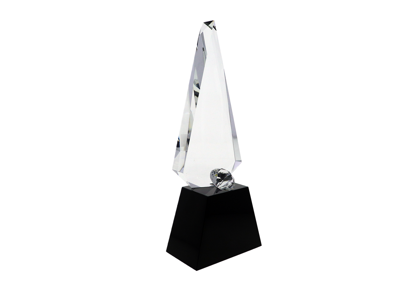 Faceted diamond in front of a crystal sculpture atop a black base | Society Awards
