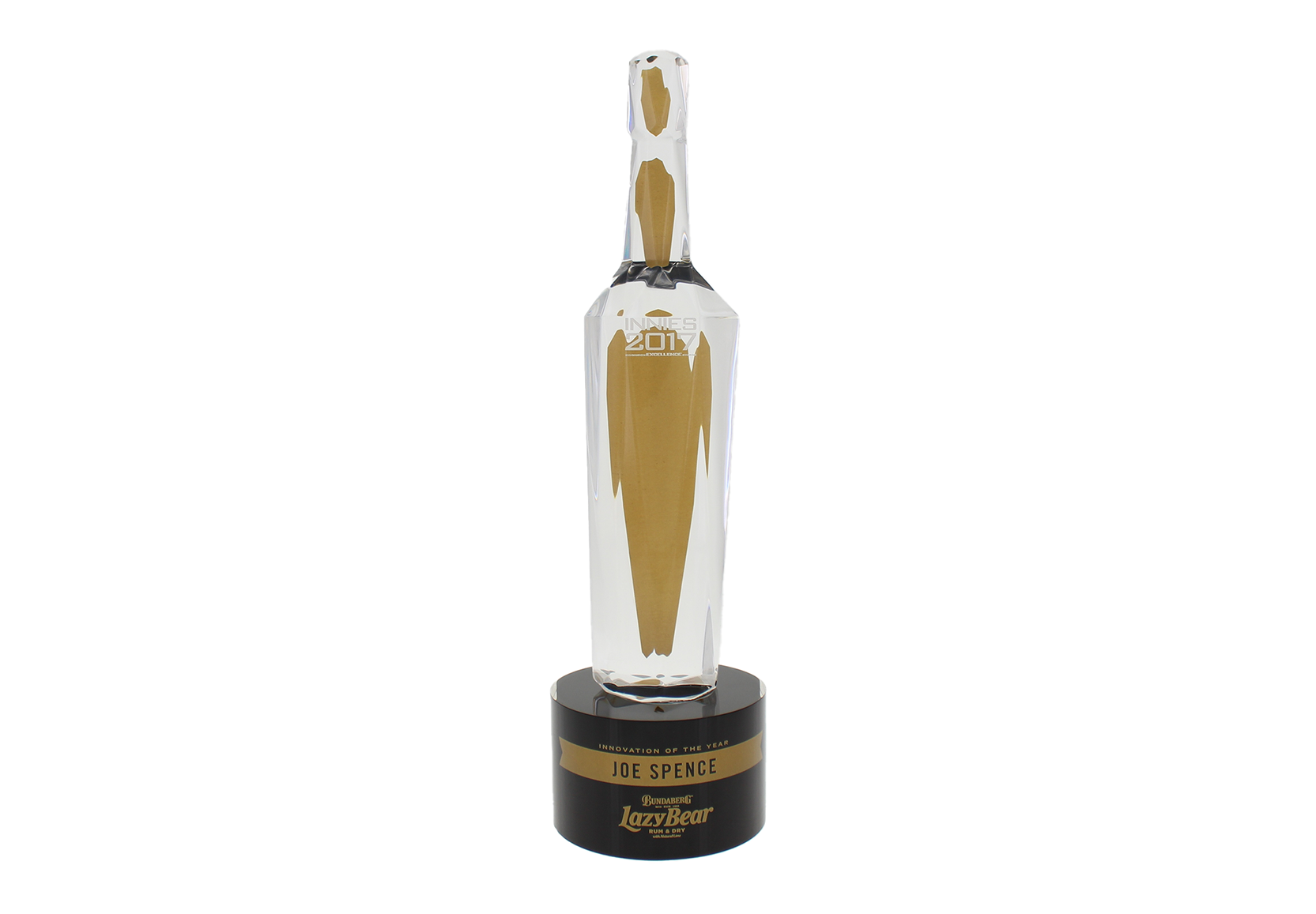 Custom bottle with gold detail atop a round black base | Society Awards