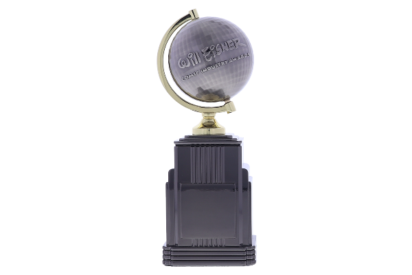 Textured metal globe with a gold arm atop a tiered black base