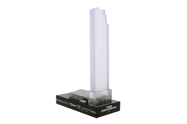 Crystal skyscraper atop black rectangular base