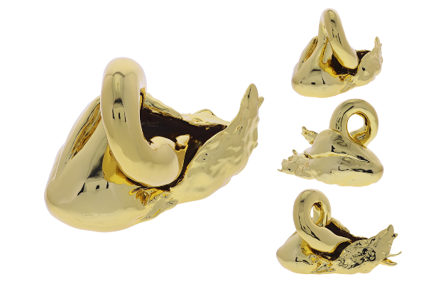 Gold sculpture of a swan tucking its head under its wing