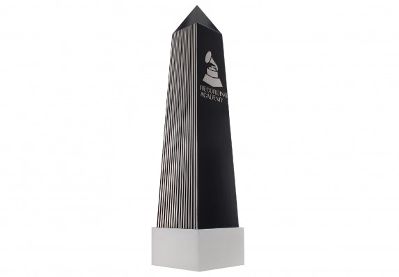 Custom Lucite obelisk award with silver detailing on brushed metal base crafted by Society Awards for the Recording Academy