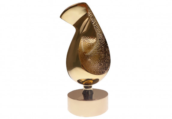 An abtract and sculptural award formed in cast metal and plated in 24k gold
