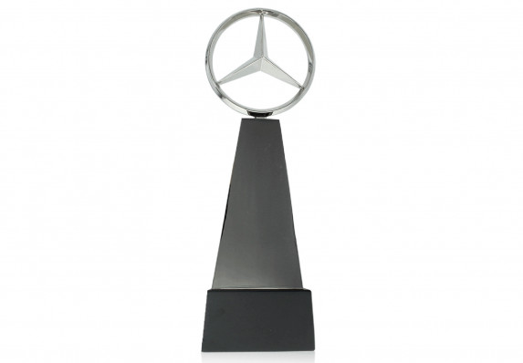 Automotive logo trophy with precision detail.
