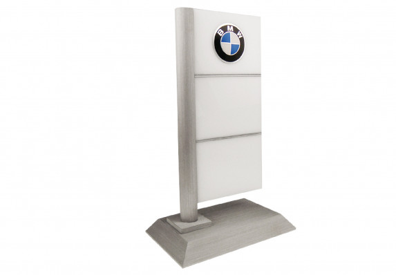 Custom award designed and manufactured by Society Awards. The shape is inspired by the signature dealership signage and crafted in aluminum and crystal.