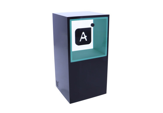 Triple cast clear and black acrylic pillar with embedded black "A" logo and green PMS color matched walls