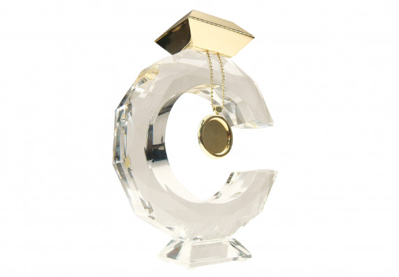 Custom award in crystal with faceted sides for a prismatic effect. Top 'jewel' is gold plated metal and hanging tag is used to display recipient information.