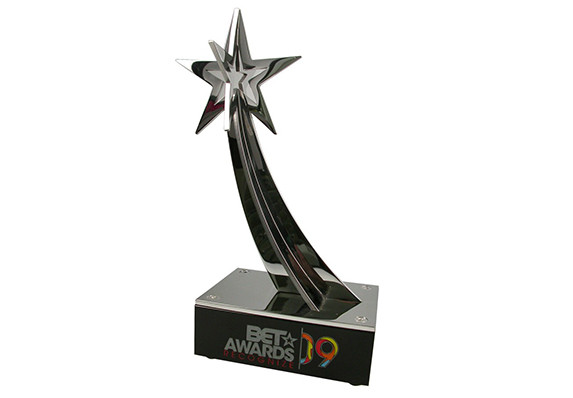 Metal fabricated steel star shape on black crystal base