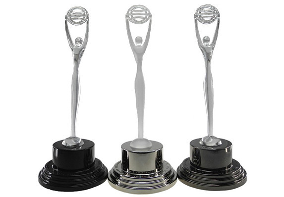 The iconic Clio figure is crafted here as a custom crystal trophy, mounted on the classic metal base in three metallic finishes.