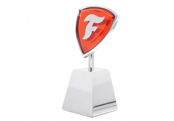 Custom jewel-like red acrylic shield with printed logo mounted on a polished aluminum base. This corporate award is an exceptional piece of recognition.