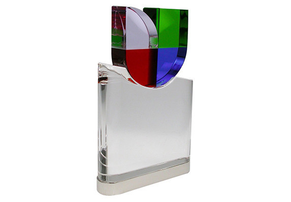 Custom corporate crystal award with brand logo. Presented to employees