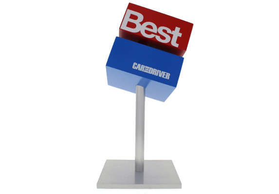 Red and Blue custom cube trophy crafted for a prestigious automotive magazine's best cars of the year program. The cube is artfully mounted atop a tall metal base.