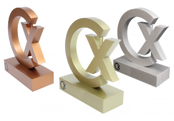 A cut out logo trophy in three brushed metal finishes. This modern recognition award inspires and honors with style.