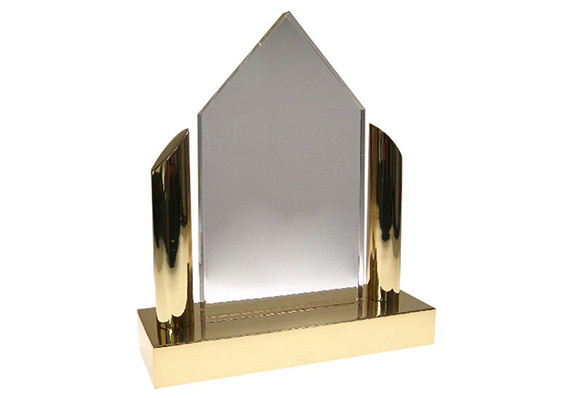 shiny polished gold columns and base with crystal peak