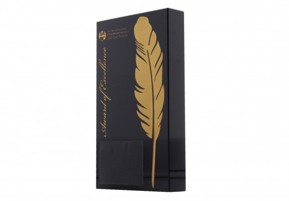 A custom black crystal award with etched and gold color-filled feather and logos. This elegant trophy is presented for excellence in communication.