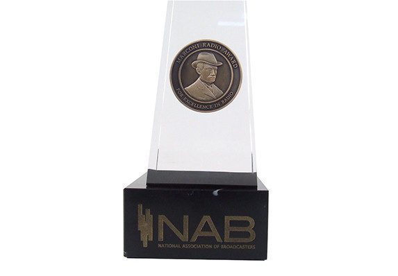 Closeup of NAB medal embedded in Lucite acrylic