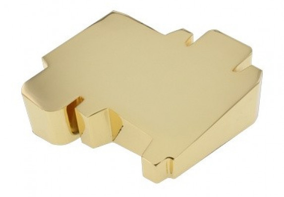 Award is shaped like an extrusion of a simple box dieline. The final form is crafted in metal and electroplated in 24k gold.