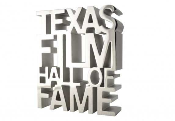 Cut out metal letters create an extruded effect in this high-end aluminum trophy crafted for a film awards program.
