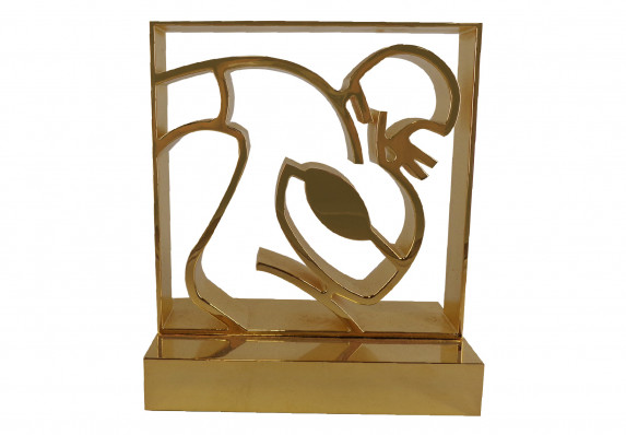 Custom cut-out of a football player in metal, final award is gold plated.