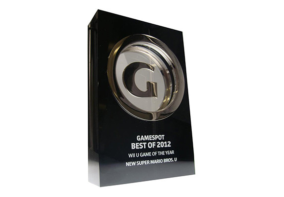 Trophy with suspended silver letter G in black crystal block. Shown with etched personalization.
