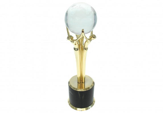 Trophy with gold-plated metal figures joining hands and holding up a crystal globe.