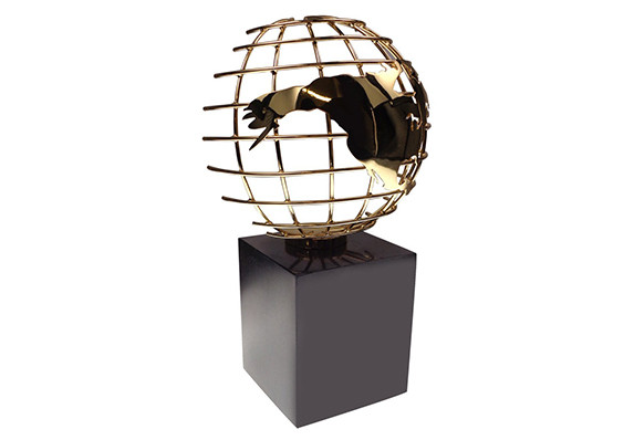Gold plated wire frame globe on marble base