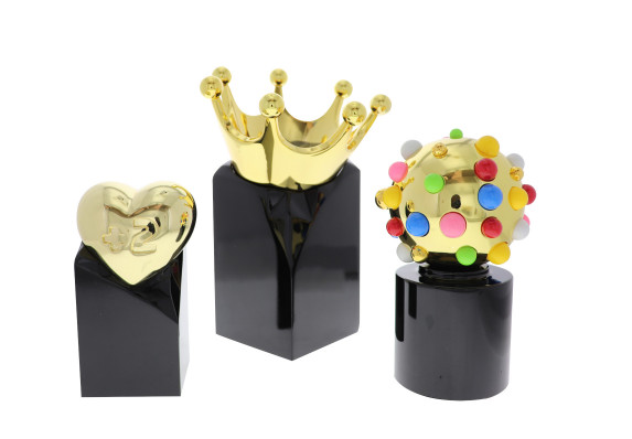 Three metal recognition awards representing various tenures