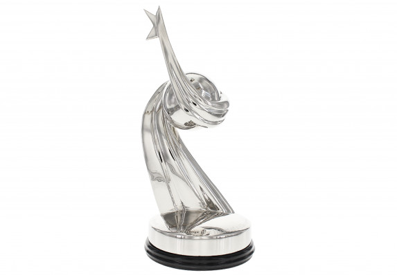 A large trophy with a sweeping form that ends in a star. The form is crafted in metal using a high-end casting process before being plated in silver chrome and hand-polished.